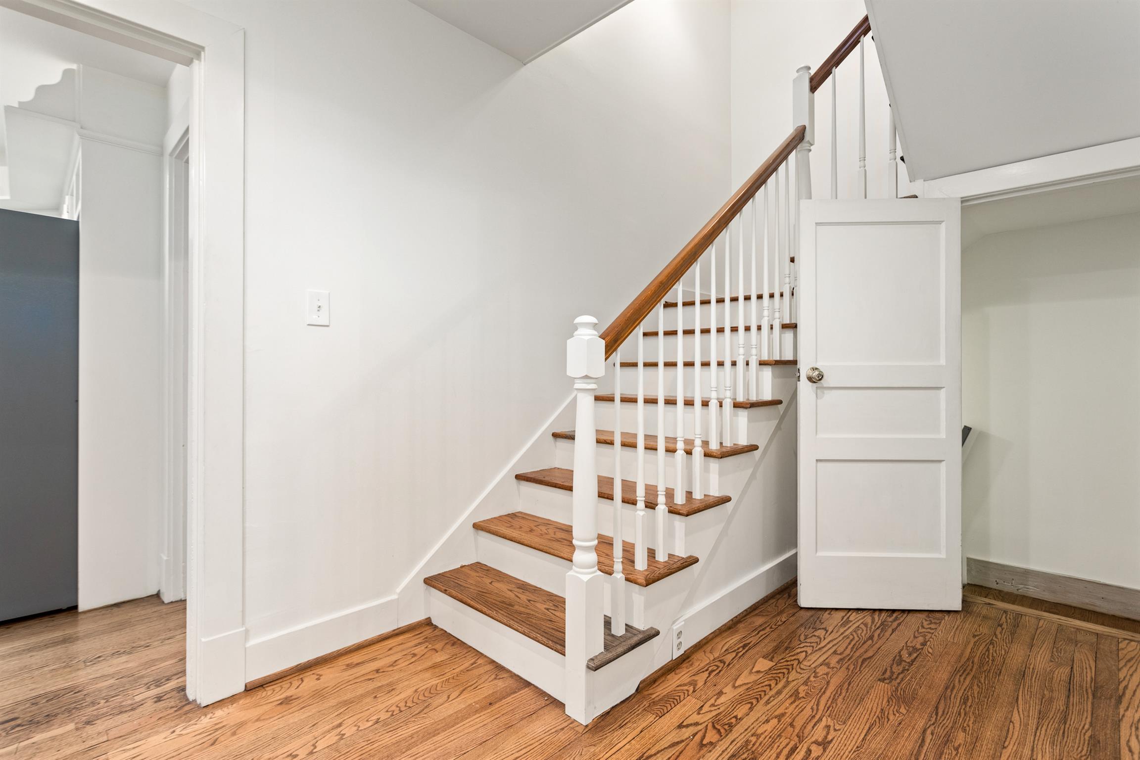 921 Fair Street Franklin, TN 37064 - Photo 22 of 30 a view of staircase with white walls and railing