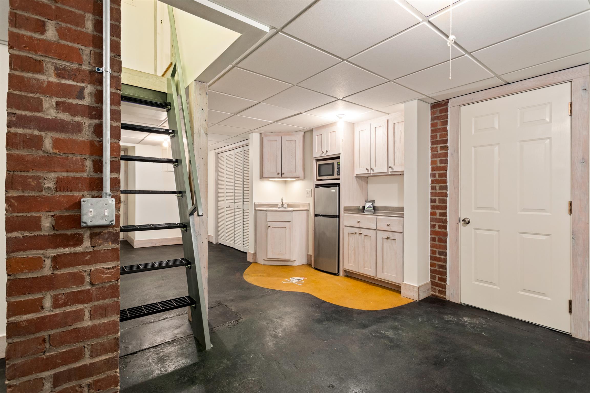 921 Fair Street Franklin, TN 37064 - Photo 28 of 30 a view of a kitchen with cabinets and wooden floor