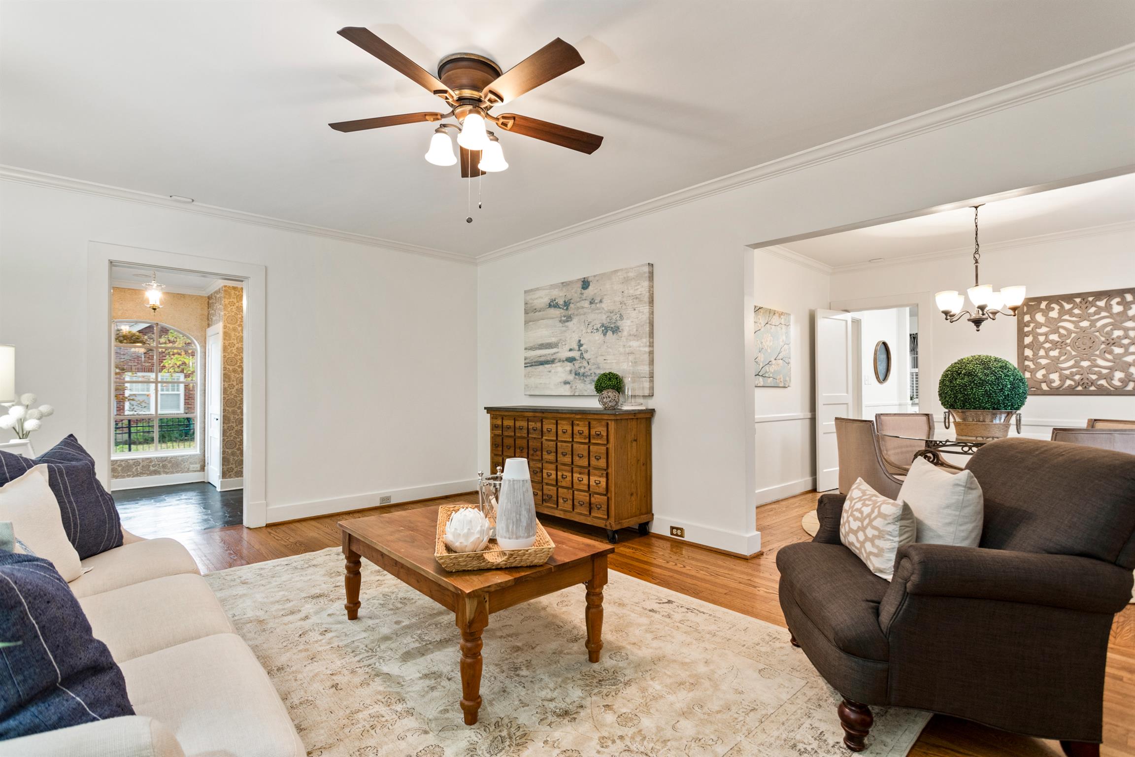 921 Fair Street Franklin, TN 37064 - Photo 8 of 30 a living room with furniture a chandelier and a window