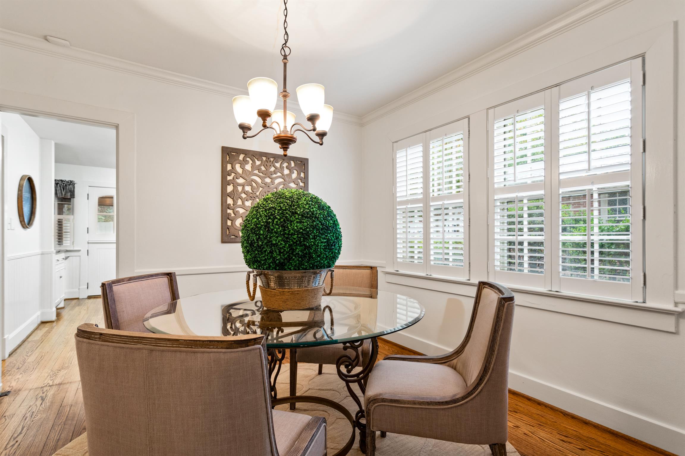 921 Fair Street Franklin, TN 37064 - Photo 9 of 30 a dining room with furniture a chandelier and wooden floor