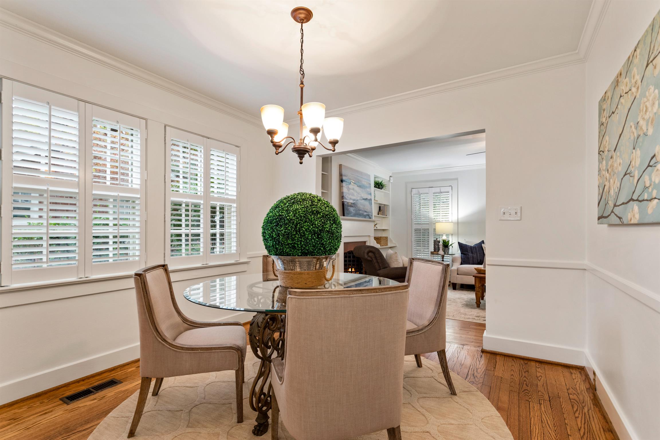 921 Fair Street Franklin, TN 37064 - Photo 10 of 30 a dining room with furniture a chandelier and wooden floor