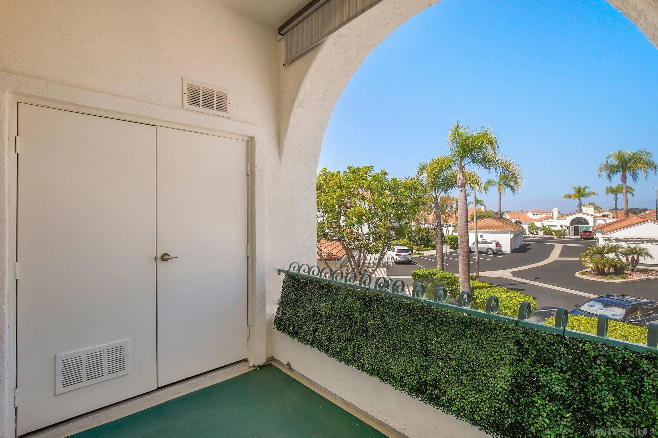 3355 Genoa Way, Unit 134 Oceanside, CA 92056 - Photo 24 of 32 a view of swimming pool from balcony