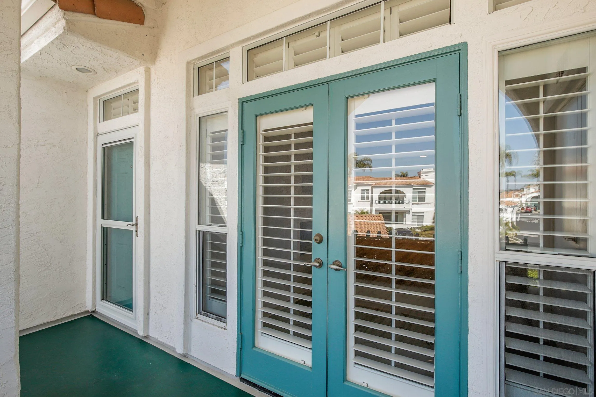 3355 Genoa Way, Unit 134 Oceanside, CA 92056 - Photo 26 of 32 a view of front door and porch