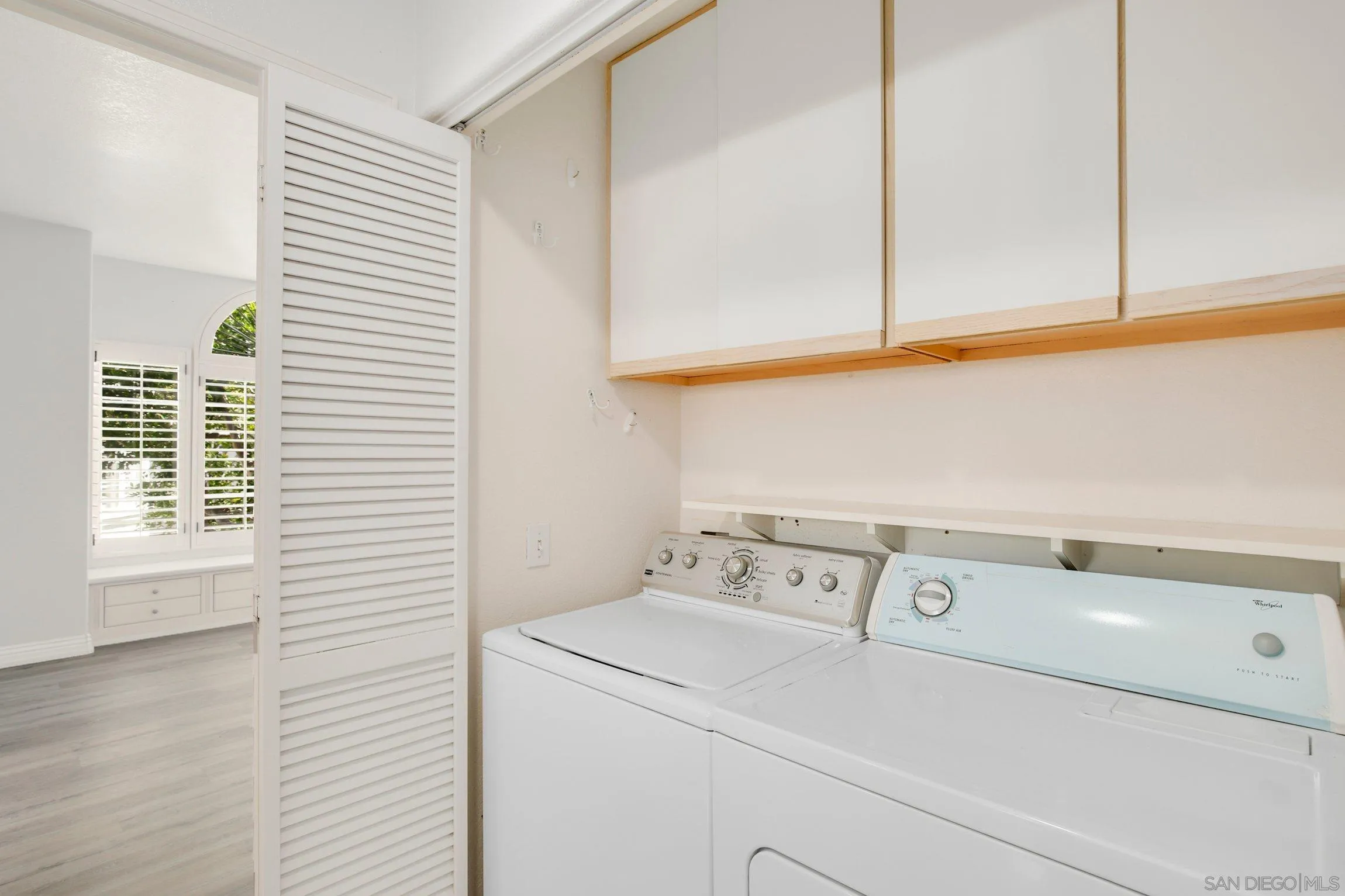 3355 Genoa Way, Unit 134 Oceanside, CA 92056 - Photo 27 of 32 a utility room with dryer and washer
