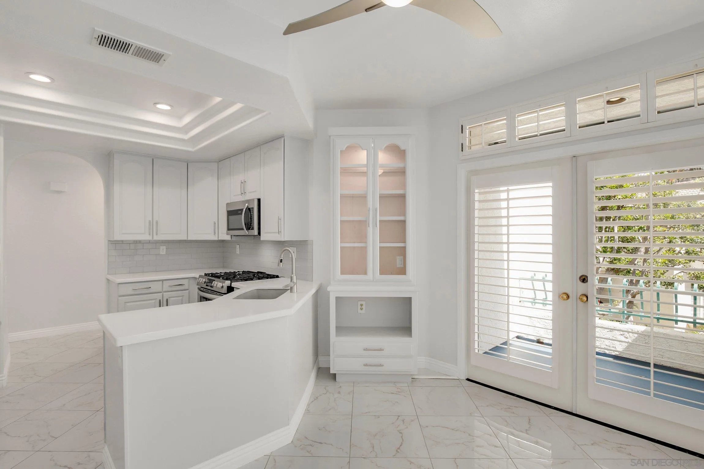 3355 Genoa Way, Unit 134 Oceanside, CA 92056 - Photo 8 of 32 a view of a kitchen with electric appliances