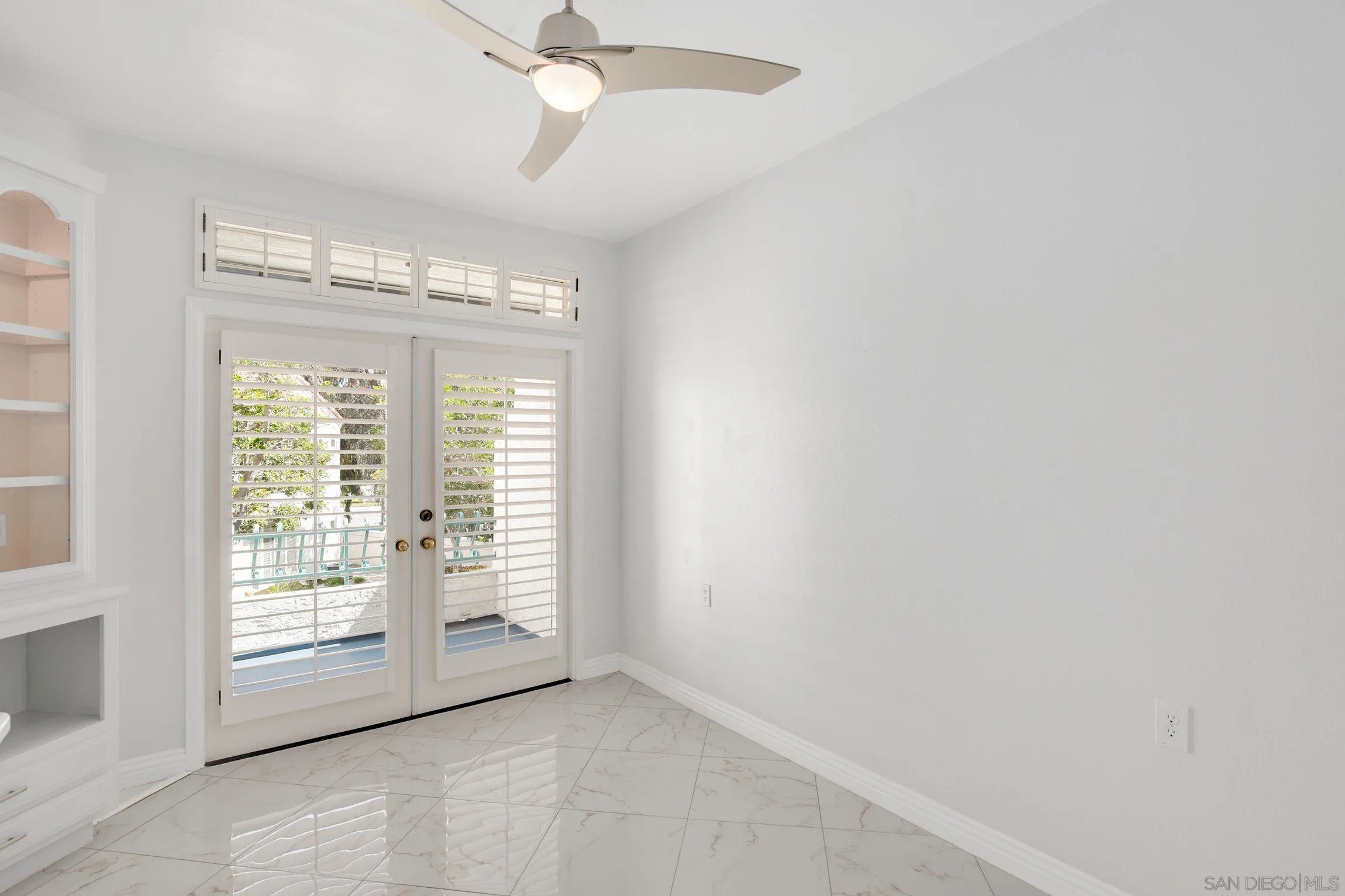 3355 Genoa Way, Unit 134 Oceanside, CA 92056 - Photo 10 of 32 a view of an empty room with a window