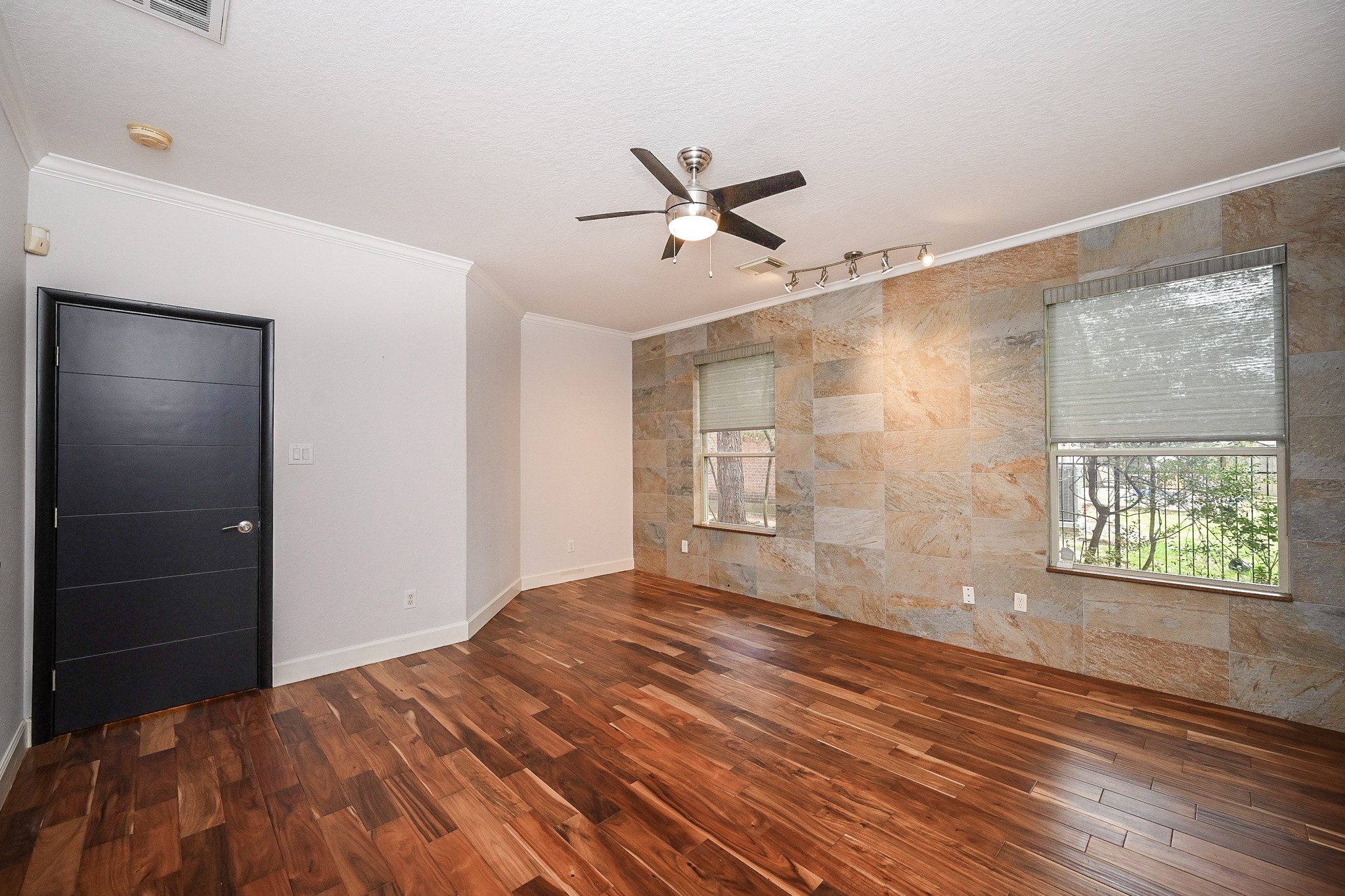 146 Rocky Point Drive Spring, TX 77389 - Photo 20 of 37 a bedroom with a bed and a window