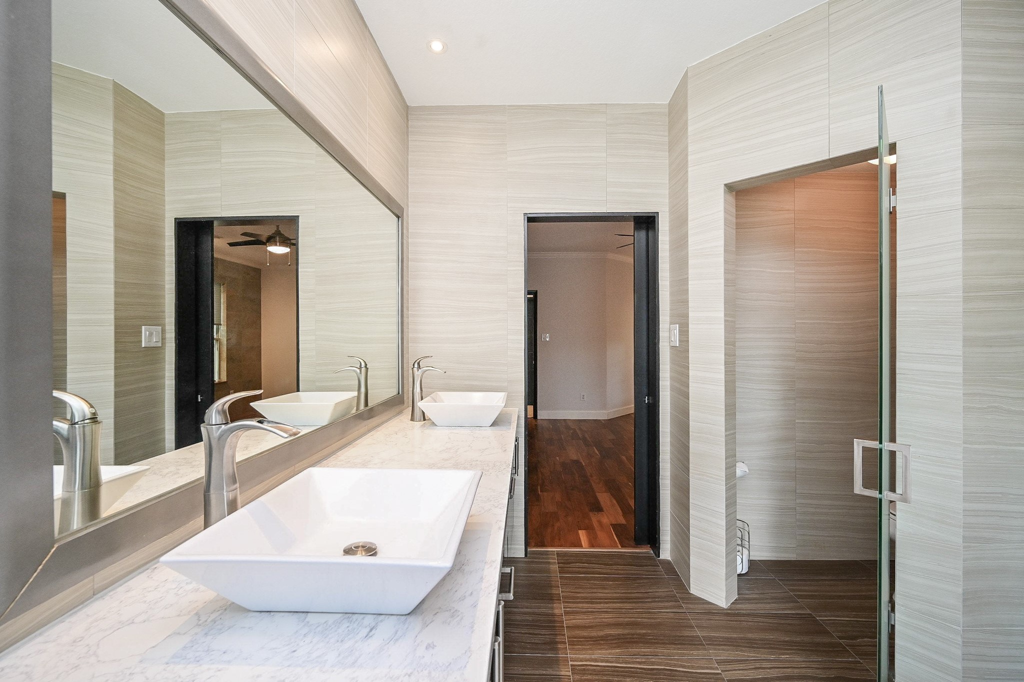 146 Rocky Point Drive Spring, TX 77389 - Photo 24 of 37 a en suite bathroom with a granite countertop sink and a mirror