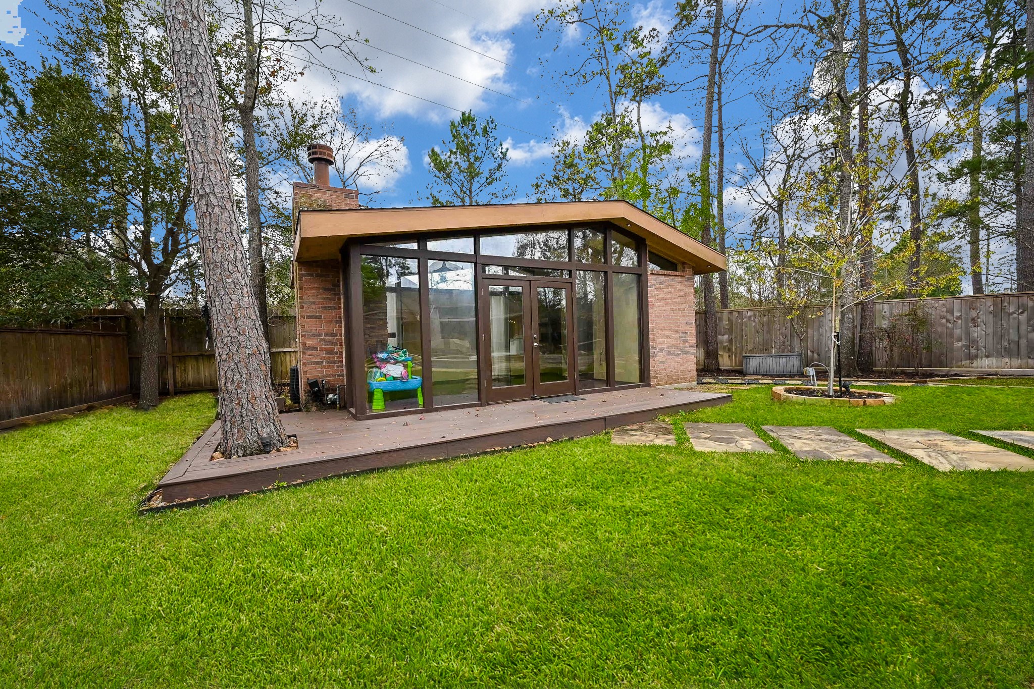 146 Rocky Point Drive Spring, TX 77389 - Photo 33 of 37 a view of a house with backyard and porch