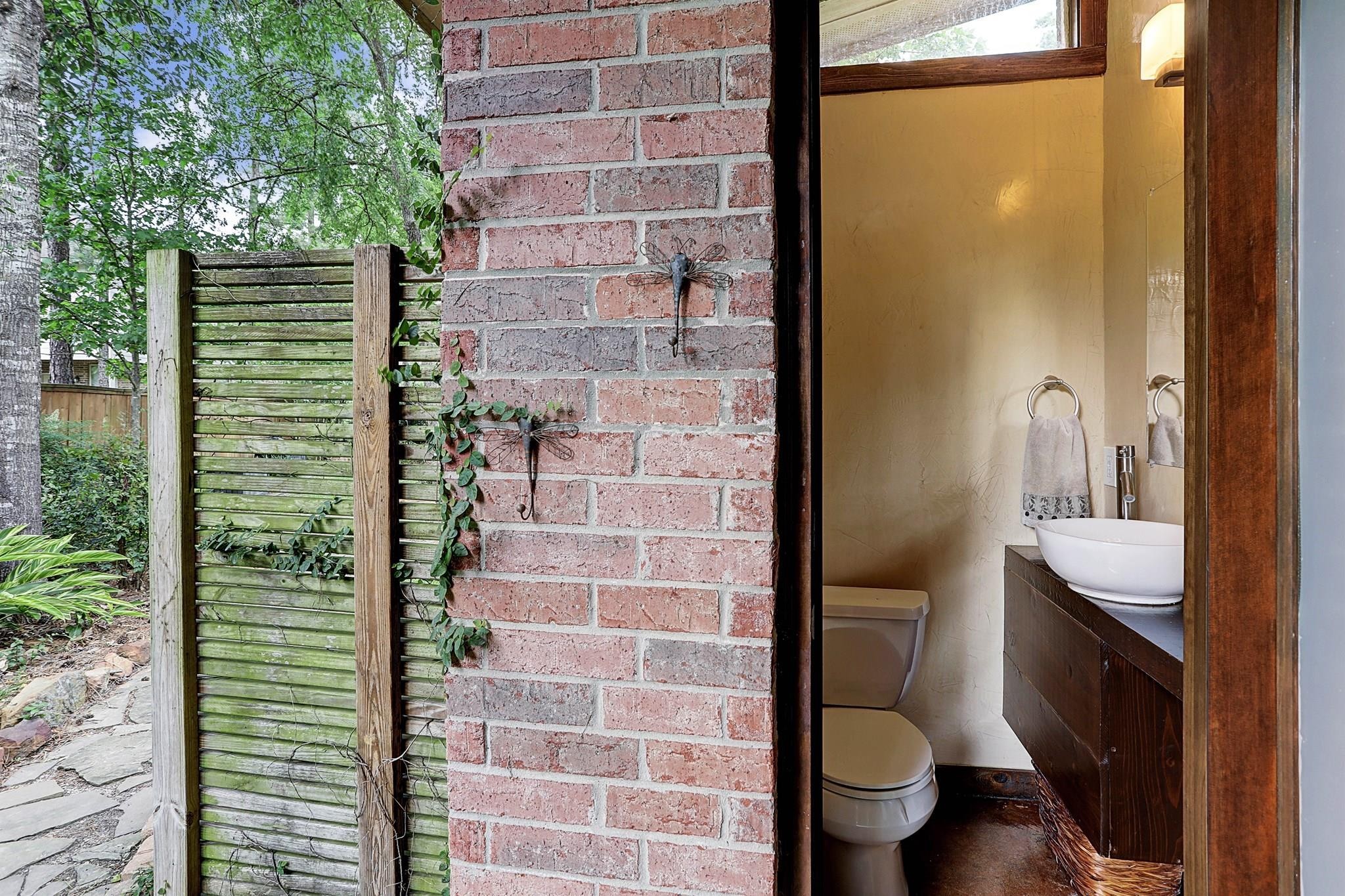 146 Rocky Point Drive Spring, TX 77389 - Photo 35 of 37 a bathroom with a toilet and a shower