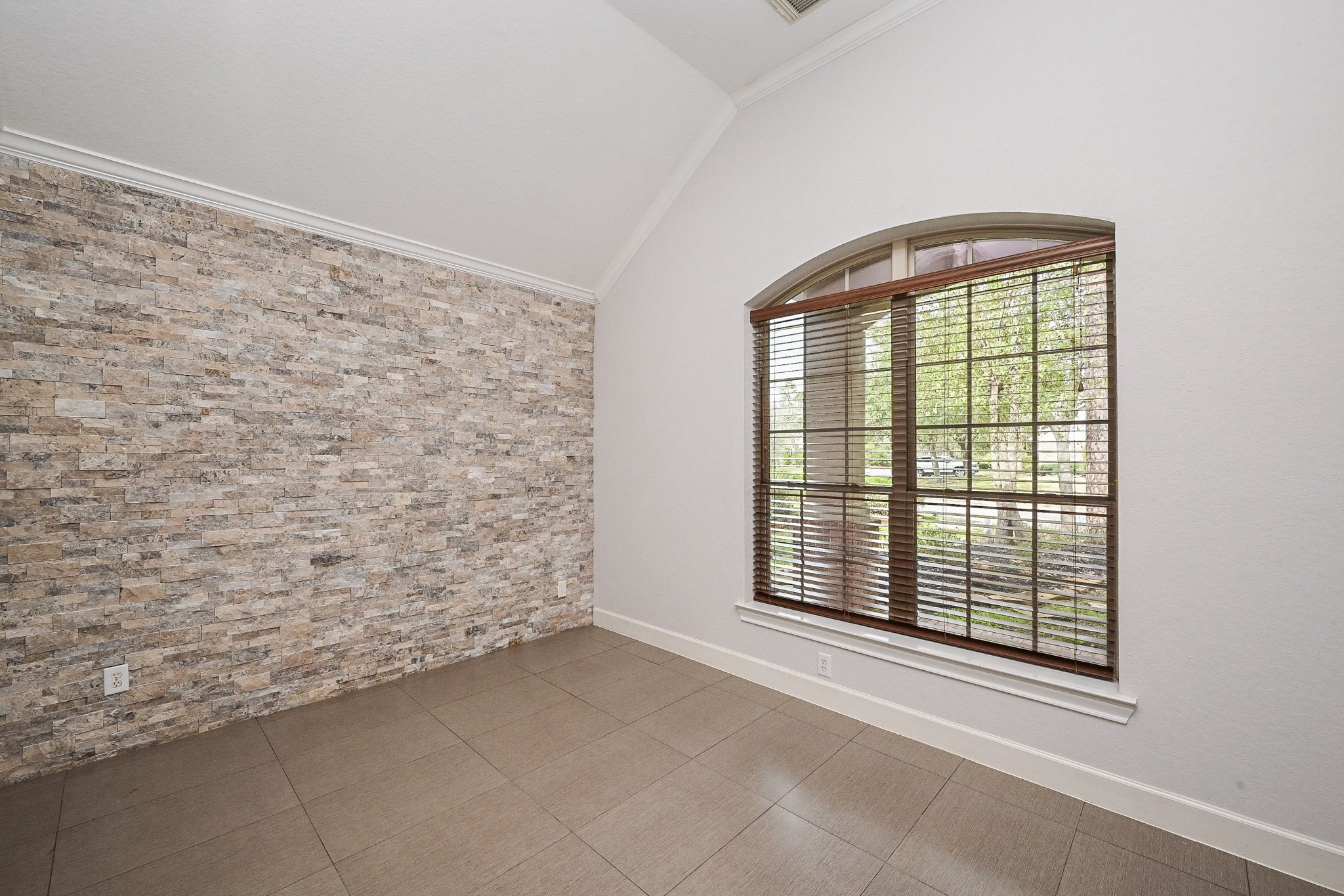 146 Rocky Point Drive Spring, TX 77389 - Photo 7 of 37 a view of an empty room with a window