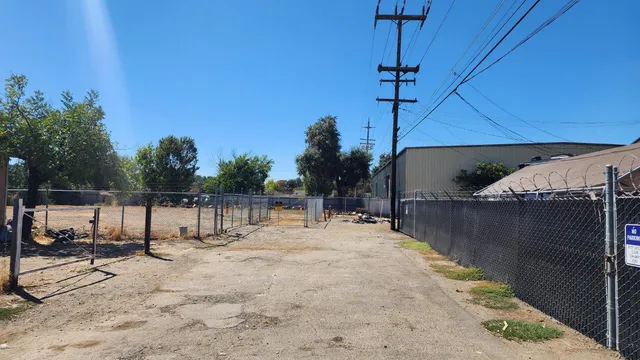 a view of a backyard of the house