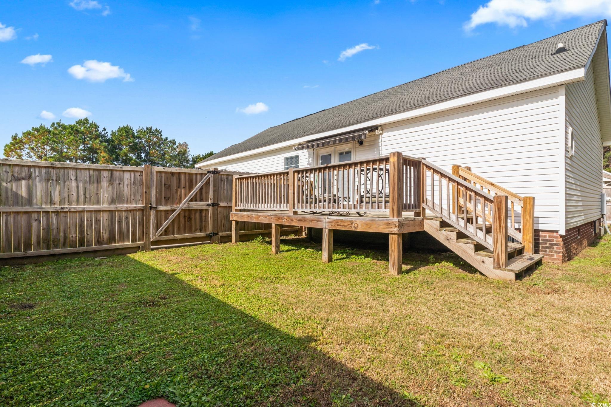 2977 Silverleaf Circle Loris, SC 29569 - Photo 31 of 36 Rear view of house featuring a fenced backyard and crawl space