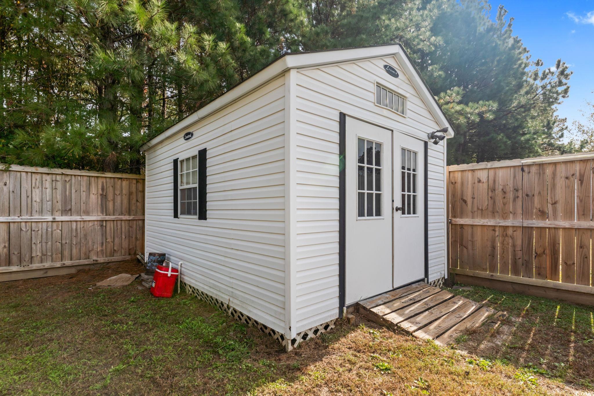 2977 Silverleaf Circle Loris, SC 29569 - Photo 34 of 36 Bungalow-style house with crawl space, a porch, and a front yard