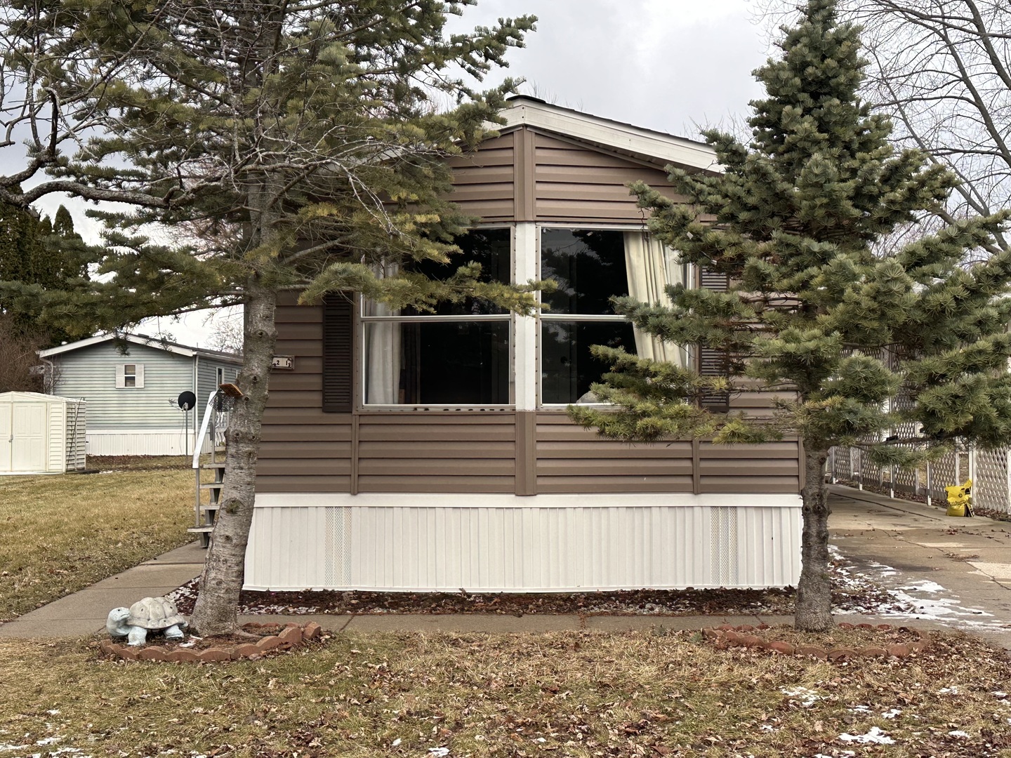 1021 Springdale Lane DeKalb, IL 60115 - Photo 2 of 12 a view of a house with a yard