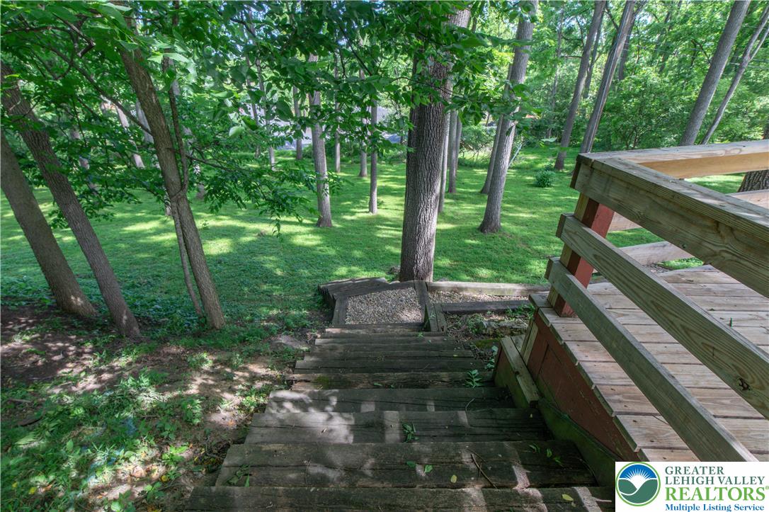 2011 Greenwood Road Allentown, PA 18103 - Photo 51 of 52 Descend into a tranquil, tree-filled landscape with direct access to verdant outdoor space.