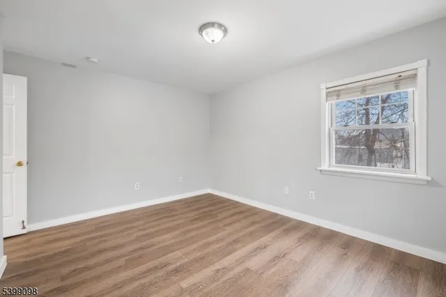 a view of a house with a street