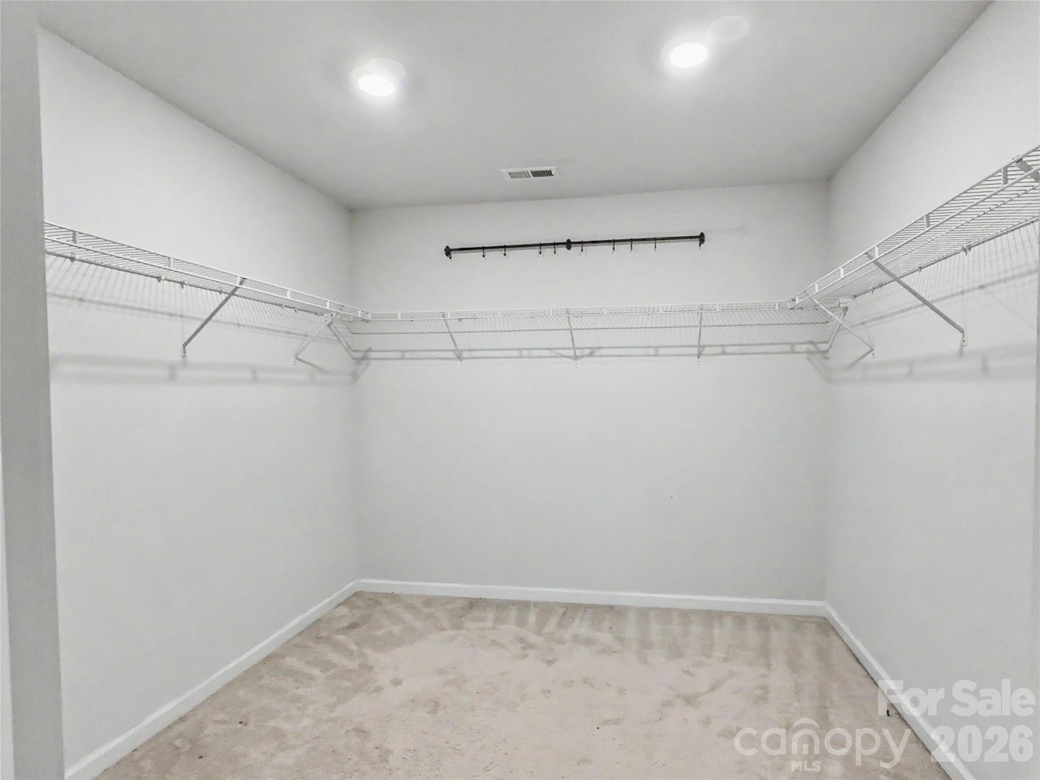 16835 Cozy Cove Road Charlotte, NC 28278 - Photo 21 of 32 a view of a room with racks on the wall