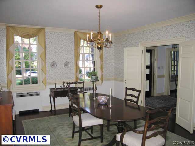 409 Henri Road Richmond, VA 23226 - Photo 5 of 10 a view of a dining room with furniture window and wooden floor