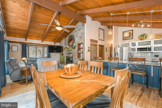 a kitchen with a sink stove top oven and cabinets