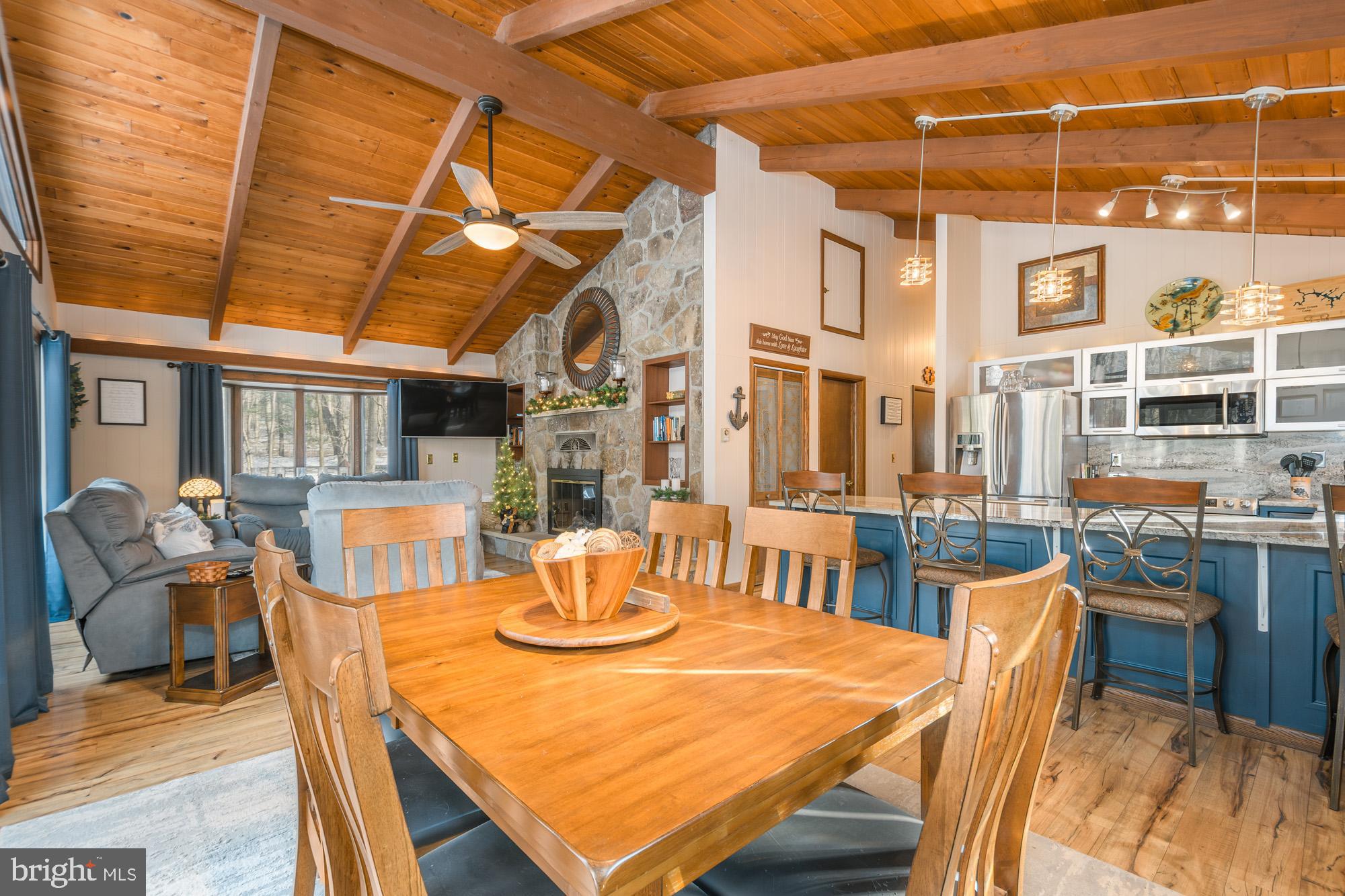 18 Frederick Circle Swanton, MD 21561 - Photo 13 of 63 a view of a dining room with furniture window and wooden floor