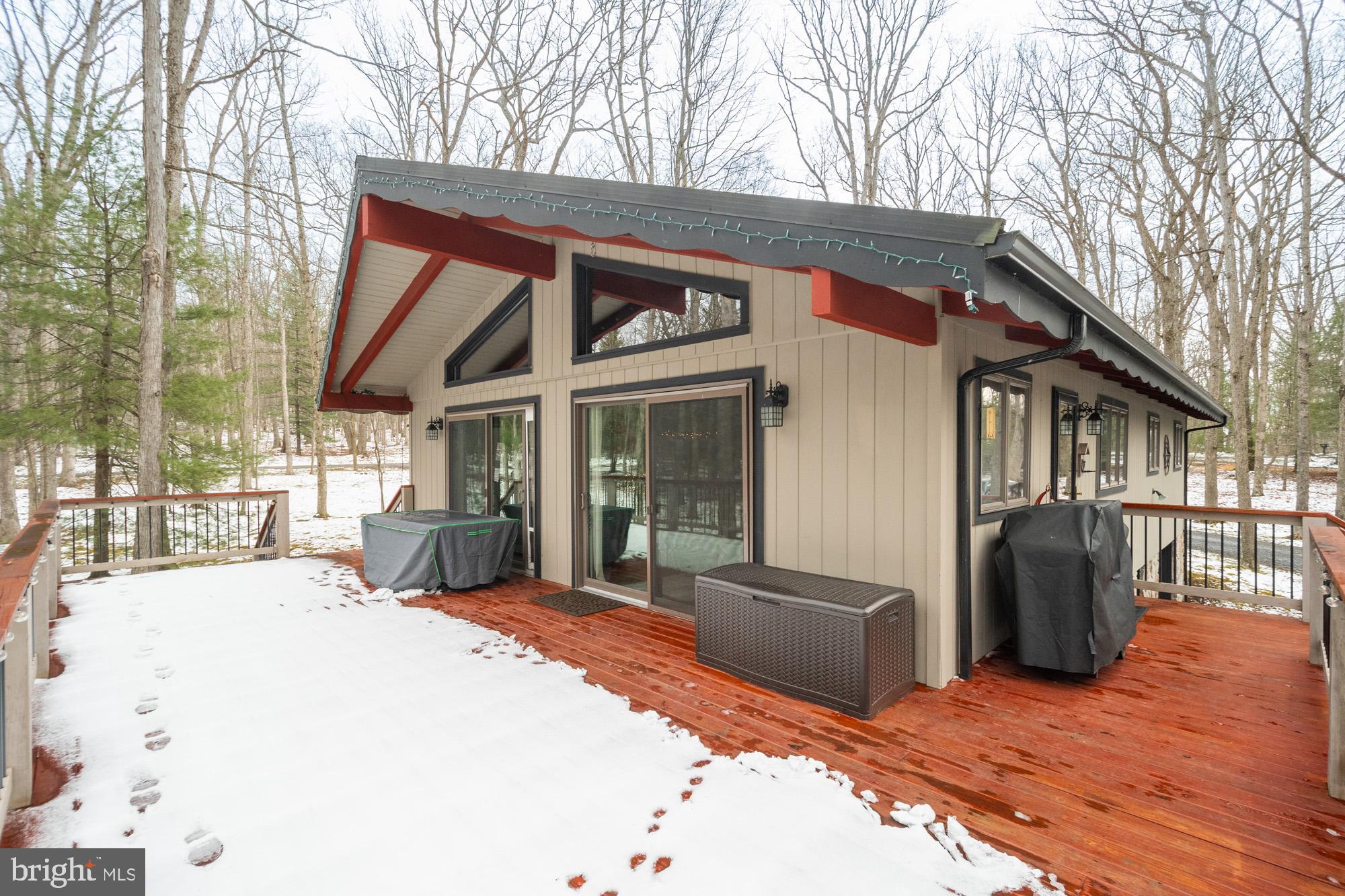 18 Frederick Circle Swanton, MD 21561 - Photo 2 of 63 a view of a house with wooden deck and furniture