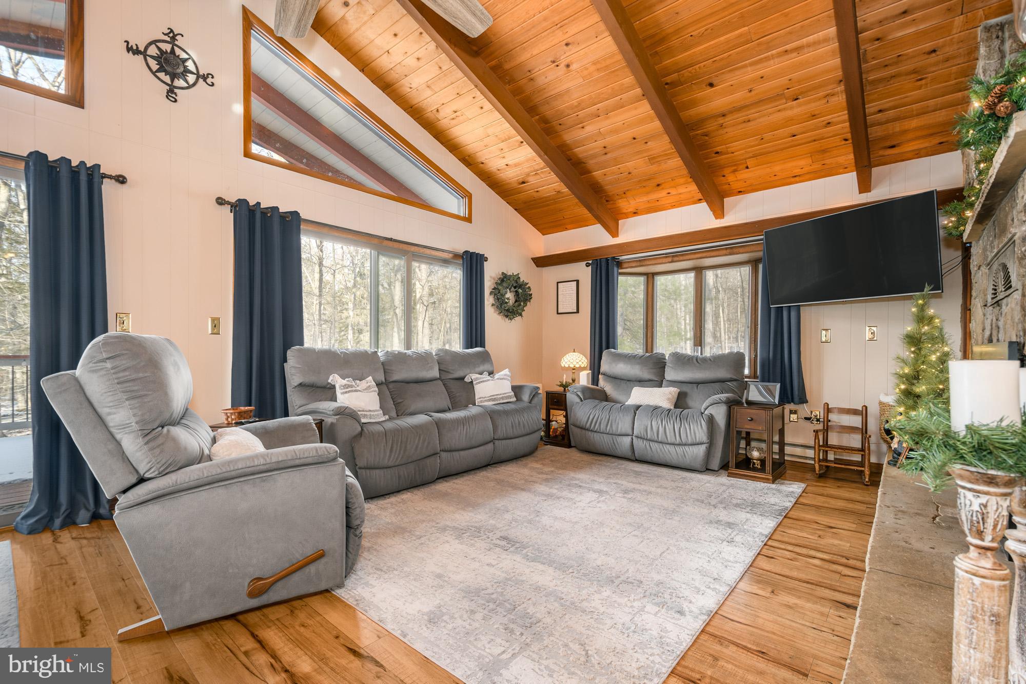 18 Frederick Circle Swanton, MD 21561 - Photo 22 of 64 a living room with furniture and a large window