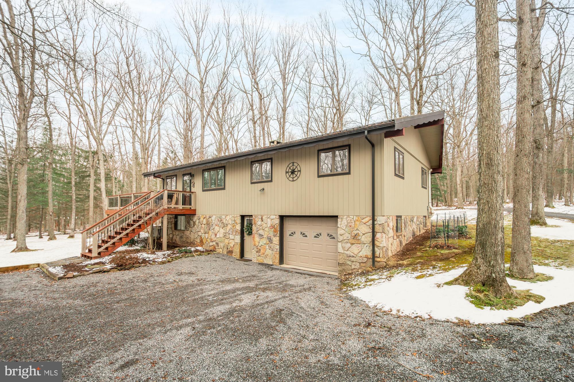 18 Frederick Circle Swanton, MD 21561 - Photo 3 of 63 a view of a house with a snow on the road