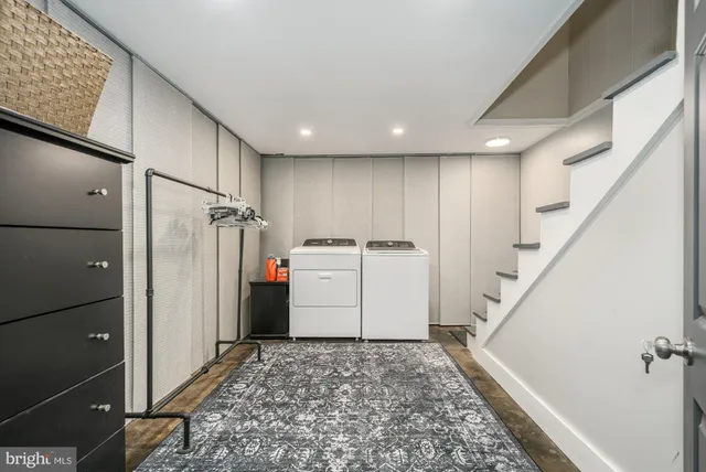a view of a backyard with table and chairs