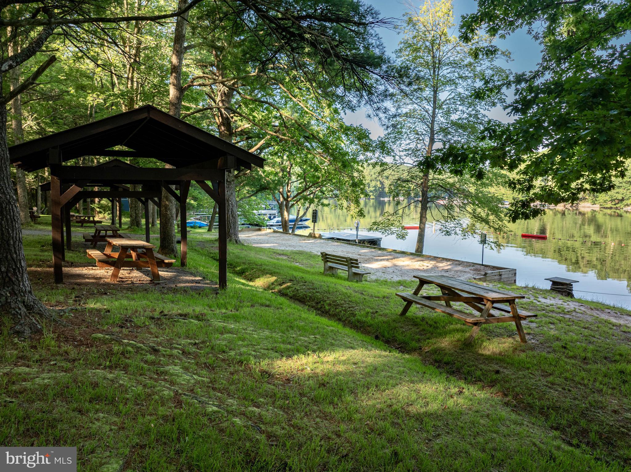 18 Frederick Circle Swanton, MD 21561 - Photo 61 of 63 a view of a backyard with table and chairs