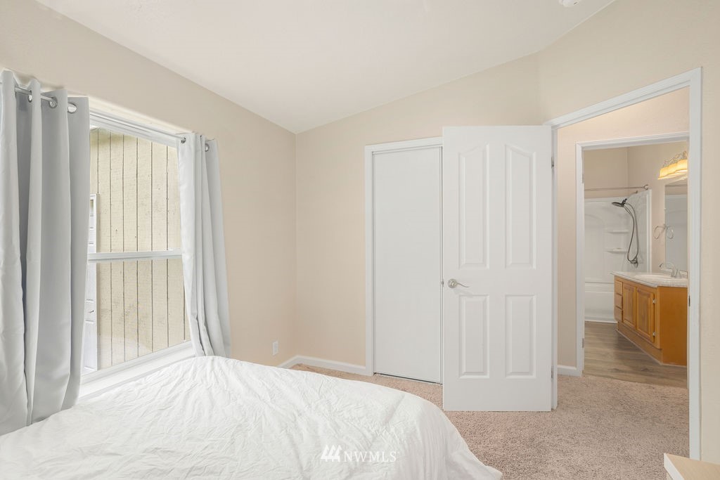 15400 Southeast 155th Place, Unit 7 Renton, WA 98058 - Photo 18 of 26 a view of a room that has a window in it