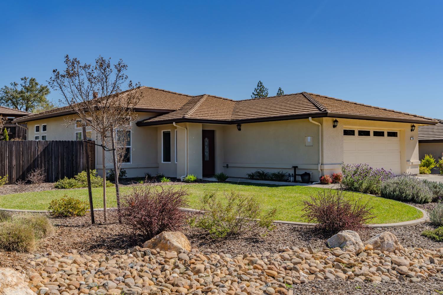 143 Emerald Lane Jackson, CA 95642 - Photo 1 of 53 a view of a house with backyard and sitting area