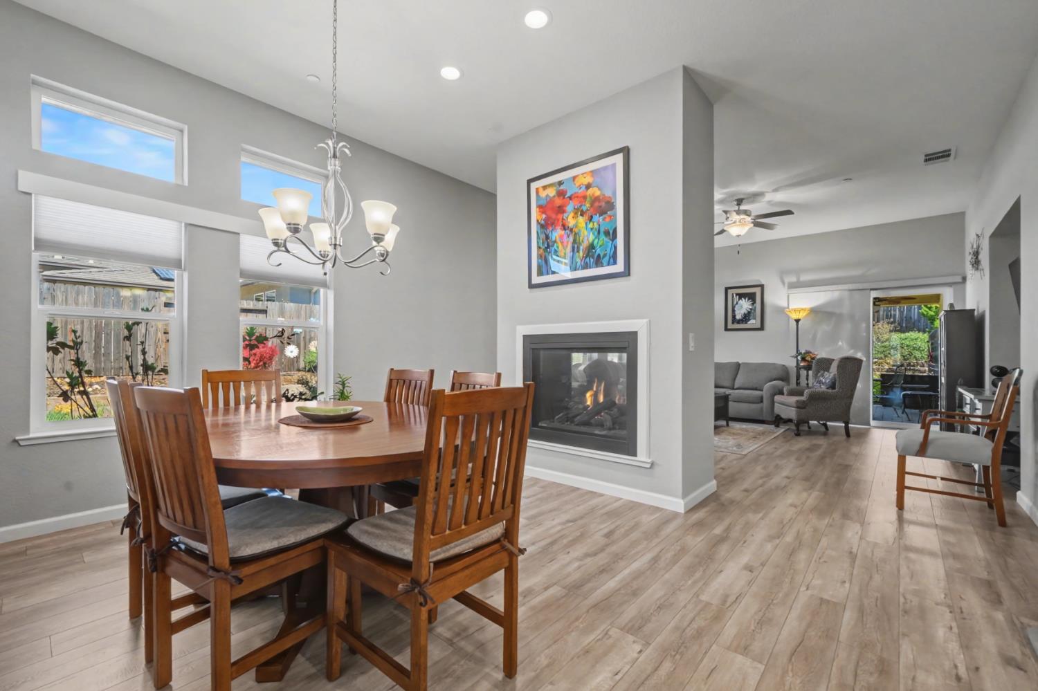143 Emerald Lane Jackson, CA 95642 - Photo 11 of 53 a view of a dining room with furniture wooden floor and chandelier