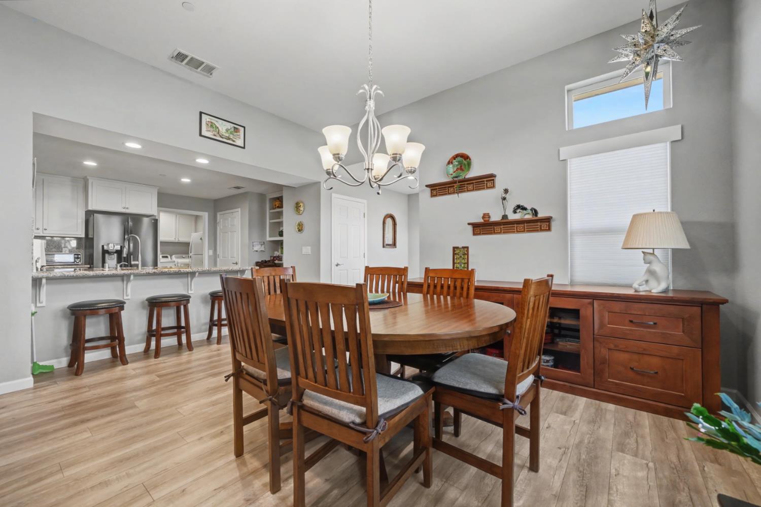 143 Emerald Lane Jackson, CA 95642 - Photo 13 of 53 a view of a dining room with furniture and wooden floor