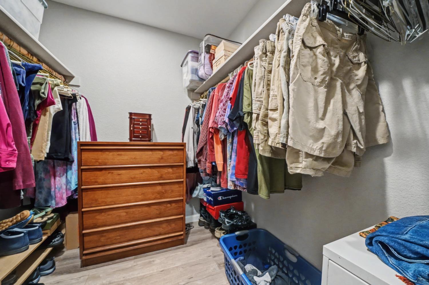 143 Emerald Lane Jackson, CA 95642 - Photo 30 of 53 a view of walk in closet with clothes and shoes