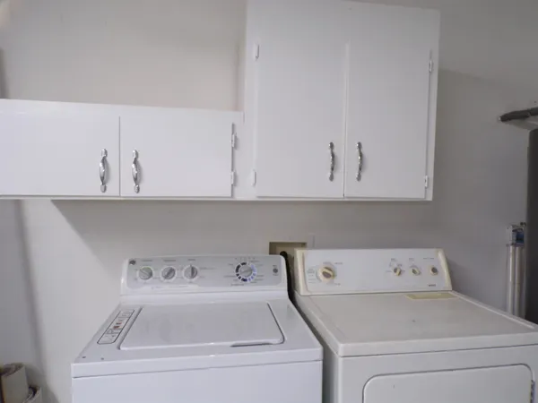 a view of utility room with washer and dryer