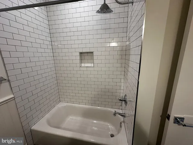 a bathroom with a bathtub
