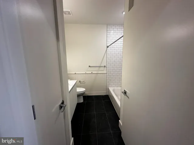 a view of hallway with stairs