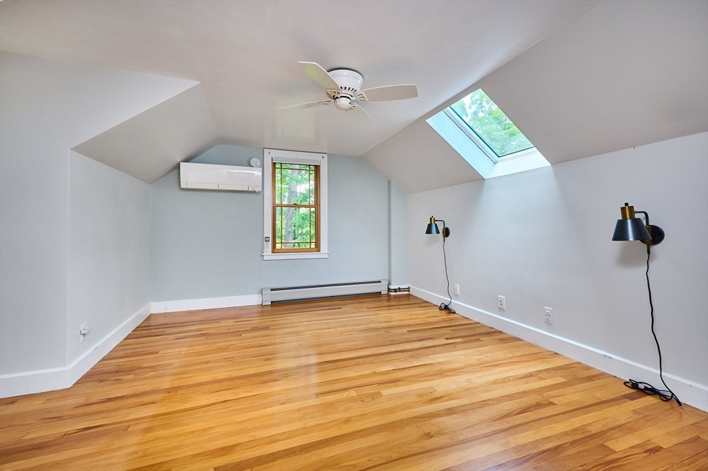 145 Chesterfield Road Northampton, MA 01053 - Photo 19 of 42 a view of a room with a wooden floor and a window