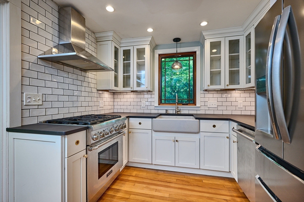 145 Chesterfield Road Northampton, MA 01053 - Photo 7 of 42 a kitchen with stainless steel appliances granite countertop a stove and a sink