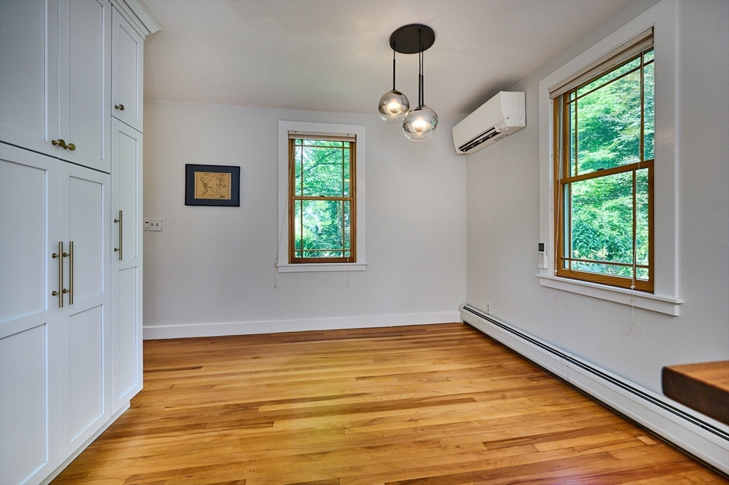 145 Chesterfield Road Northampton, MA 01053 - Photo 10 of 42 a view of an empty room with a window