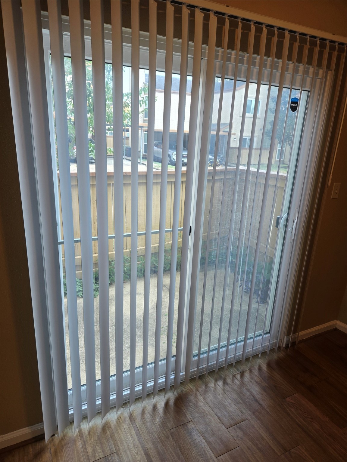 13210 Old Richmond Road, Unit A Houston, TX 77083 - Photo 16 of 21 a view of a porch with wooden floor