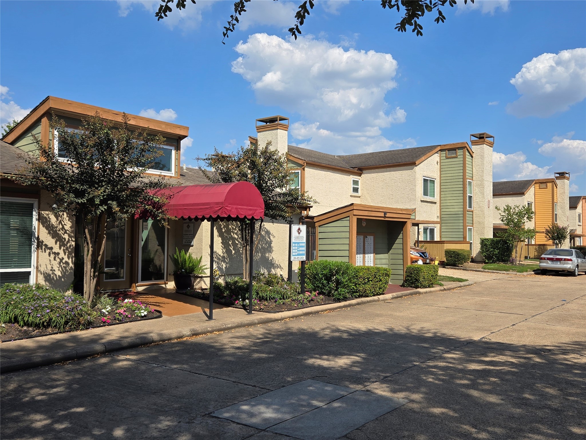 13210 Old Richmond Road, Unit A Houston, TX 77083 - Photo 3 of 21 a view of a street with a building in the background