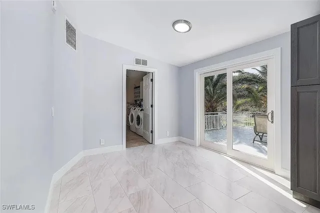 a view of a backyard of a house