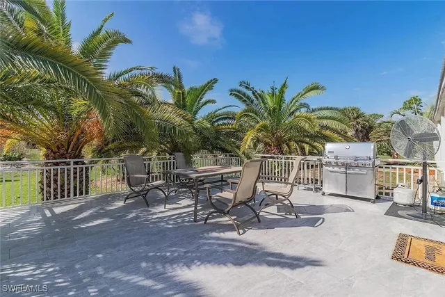 a kitchen with stainless steel appliances granite countertop a stove a sink dishwasher a refrigerator and a refrigerator