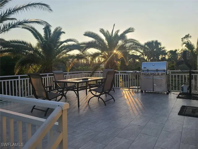 a view of balcony with furniture