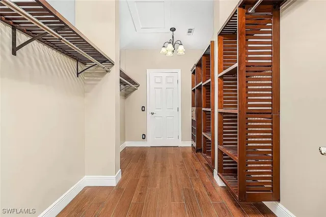 a view of wooden floor and staircase in a room