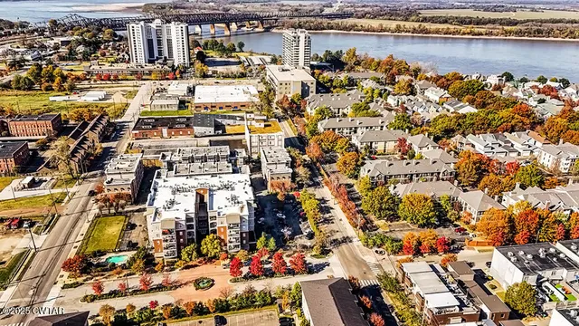 a building with trees in front of it