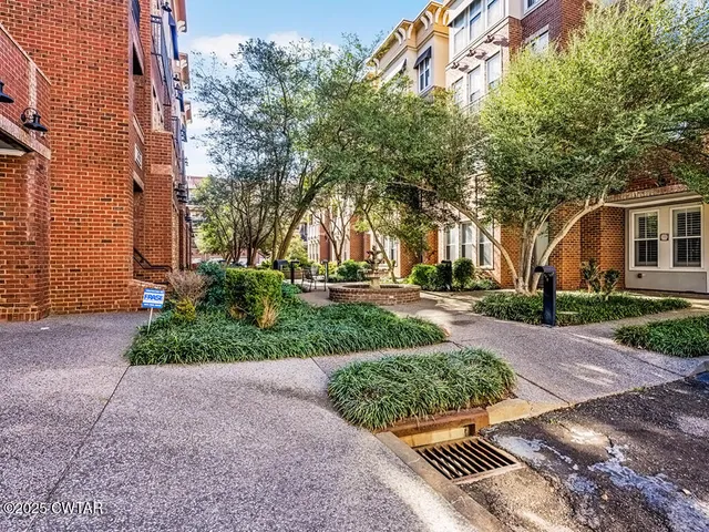a view of city with tall buildings