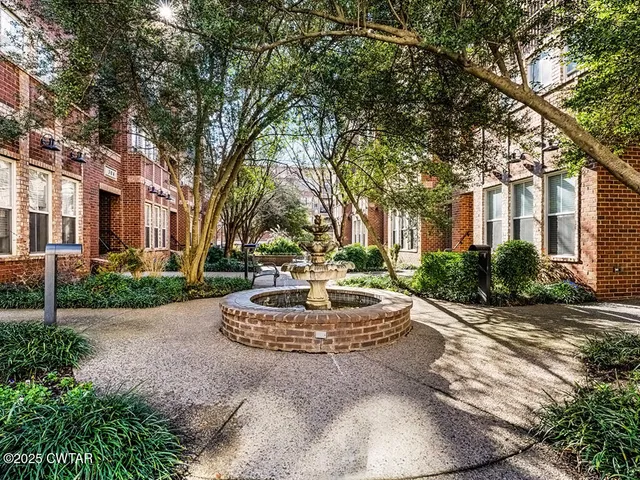 a view of street with parked cars